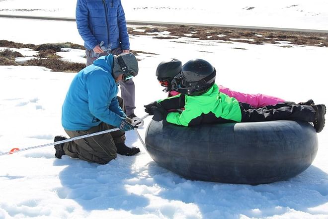 Snowmobile and slide Family tour