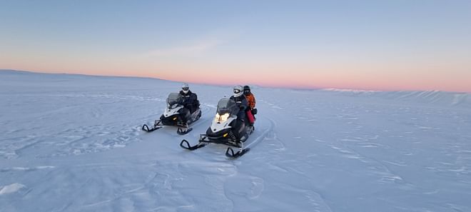 Snowmobile and slide Family tour